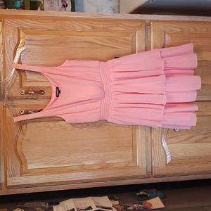 NWT. Flirty  ruffles waist down. Bodice has soft pleating.Elastic waist.peach co